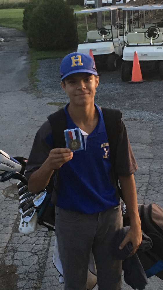 Golf improves to 2-0. Scripture medals for second time